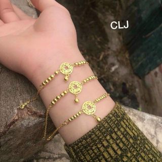 Lắc tay Kim tiền màu vàng tây