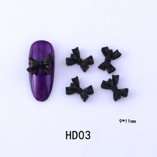 Nơ đen gắn móng