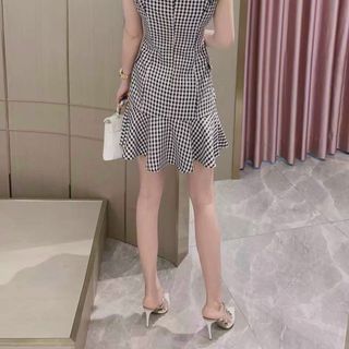 Đầm caro vest TK siêu đẹp.