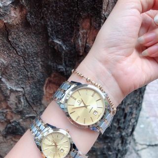 Đồng hồ nam nữ cặp inox Omg thép không gì