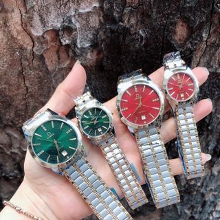 Đồng hồ nam nữ cặp inox Omg thép không gì