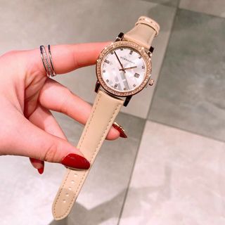 Đồng hồ nữ dây da mặt tròn viền hột Bur,bery
