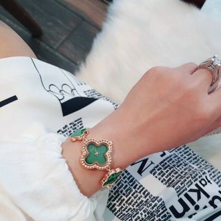 Đồng hồ lắc tay hoa Van,cleef
