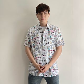 Sơ mi cặp đôi hoạ tiết mặt cười form rộng unisex