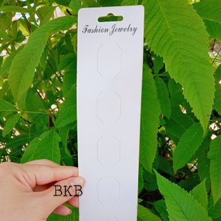 BÌA GIẤY TRƯNG BÀY CỘT TÓC KẸP TÓC