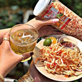 Mưcj hấp nước dừa xé sợi ( hu pet 300gr)