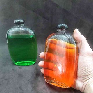Chai thủy tinh dẹp 350ML mẫu bầu dục nắp nhựa đen tròn - Vỏ chai thủy tinh dẹt 350ML – Chai thủy tinh đựng dầu dừa , rươu, thức uống, mỹ phẩm, dược phẩm