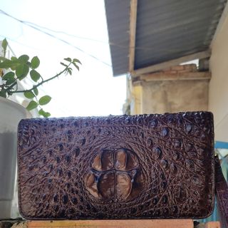 Clulth cầm tay cá sấu