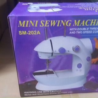 Máy khâu mini gia đình cầm tay tiện dụng Máy may CMD hỗ trợ may vá