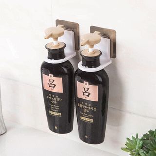 Móc Treo Chai Dầu Gội Dán Tường