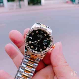 Đồng hồ Role nam nữ pin kim trôi dây thép đúc