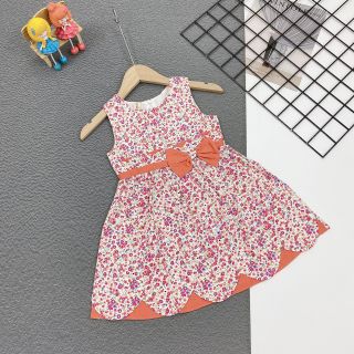 Đầm bông đính nơ phối lai lượn