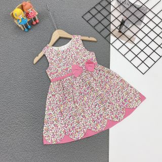 Đầm bông đính nơ phối lai lượn