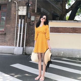 ĐẦM CHẤM BI VÀNG CAM TAY LỠ
