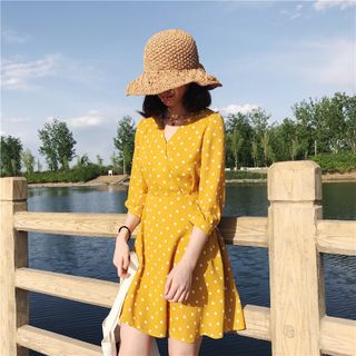 ĐẦM CHẤM BI VÀNG CAM TAY LỠ