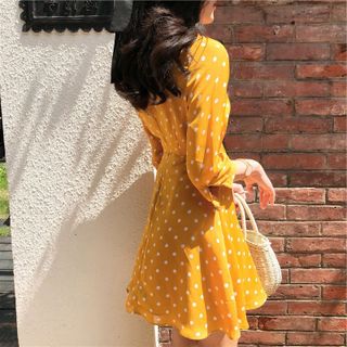 ĐẦM CHẤM BI VÀNG CAM TAY LỠ
