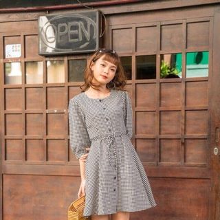 ĐẦM CARO ĐEN TAY LỠ
