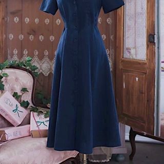ĐẦM SƠ MI XANH ĐEN NÚT BỌC