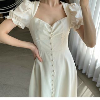 ĐẦM TRẮNG NHÚNG NGỰC NÚT BỌC