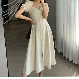 ĐẦM TRẮNG NHÚNG NGỰC NÚT BỌC