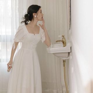 ĐẦM TRẮNG CỔ KHÓA TAY NƠ
