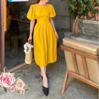 ĐẦM VÀNG CỔ TRÒN XẾP LI