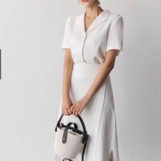 ĐẦM SƠ MI CỔ VEST TRẮNG LỆCH TÀ