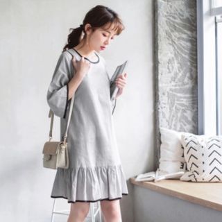 ĐẦM XÁM VIỀN ĐEN TAY LỠ