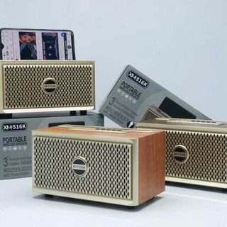 Loa bluetooth vỏ vân gỗ XM 516K có đỡ điện thoại