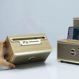 Loa bluetooth vỏ vân gỗ XM 516K có đỡ điện thoại