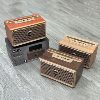 Loa bluetooth vỏ vân gỗ XM 516K có đỡ điện thoại