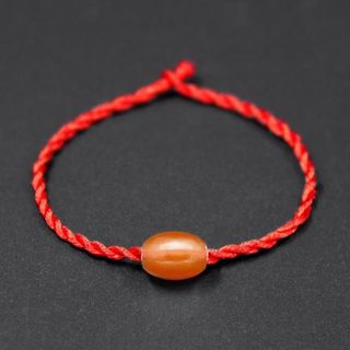 Dây đỏ kèm mặt đeo tay mai mắn 2k