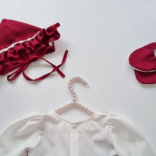 Sang chảnh xuất sắc vơis body váy mận chín giả yếm phối nơ xinh