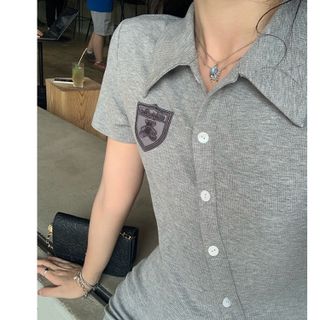 Váy Đầm Polo Dáng Ôm Cúc Lệch Logo Gấu