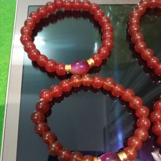 Chuỗi đeo tay mẫu mới màu đỏ mix charm