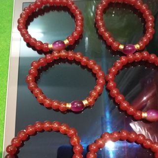 Chuỗi đeo tay mẫu mới màu đỏ mix charm