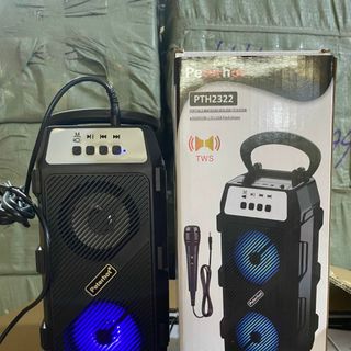 Loa bluetooth PTH2322 tặng kèm mic karaoke âm thanh cực hay. Đèn Led nháy theo nhạc đẹp mắt