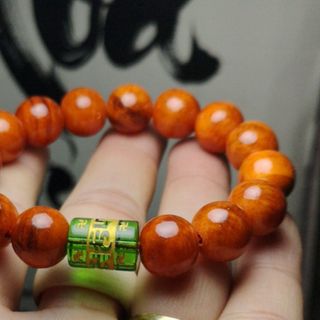 Vòng tay huyết long mix nu thống