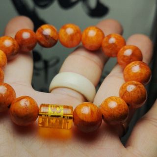 Vòng tay huyết long mix nu thống