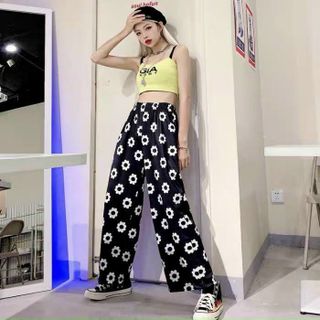 Quần dài in bông cúc chất da cá