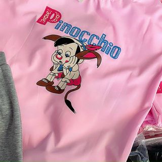 Đồ bộ mặc nhà áo thun cotton quần bozip co giản logo in Pinocchio