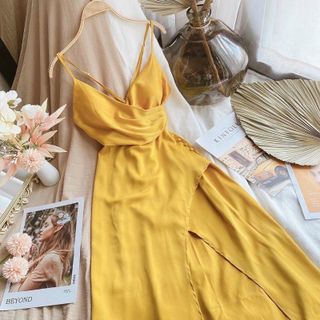 Đầm váy maxi vàng đi biển nút eo xẻ ta