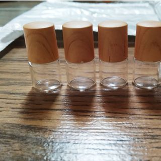 sỉ số lượng vỏ chai 1ml bi lăn thép nấp vân gỗ đựng tinh dầu chống rà dịch ra ngoài mẫu cao cấp