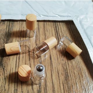sỉ số lượng vỏ chai 1ml bi lăn thép nấp vân gỗ đựng tinh dầu chống rà dịch ra ngoài mẫu cao cấp