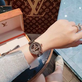 ĐỒNG HÔ L V DÂY DA MẶT XOAY NỮ