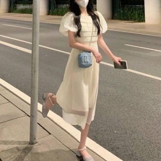 Đầm midi xốp kem xếp ngực