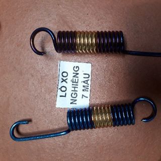 Lò xo chân trống titan