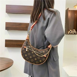 TÚI KẸP NÁCH XÍCH HOẠ TIẾT