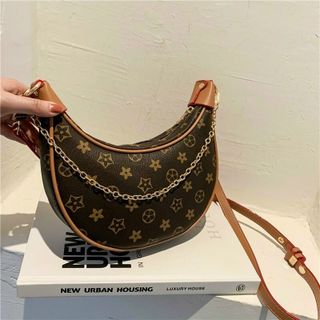 TÚI KẸP NÁCH XÍCH HOẠ TIẾT