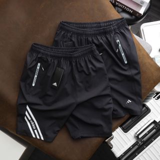 Quần short thun , quần đùi nam chất dù xi giãn dày mịn co giãn 4 chiều thoải mái, 3 túi khoá kéo. Logo thêu size từ 55kg - 85kg